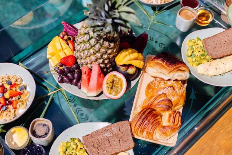 Floating breakfast at amazing hotel villa in blue swimming pool